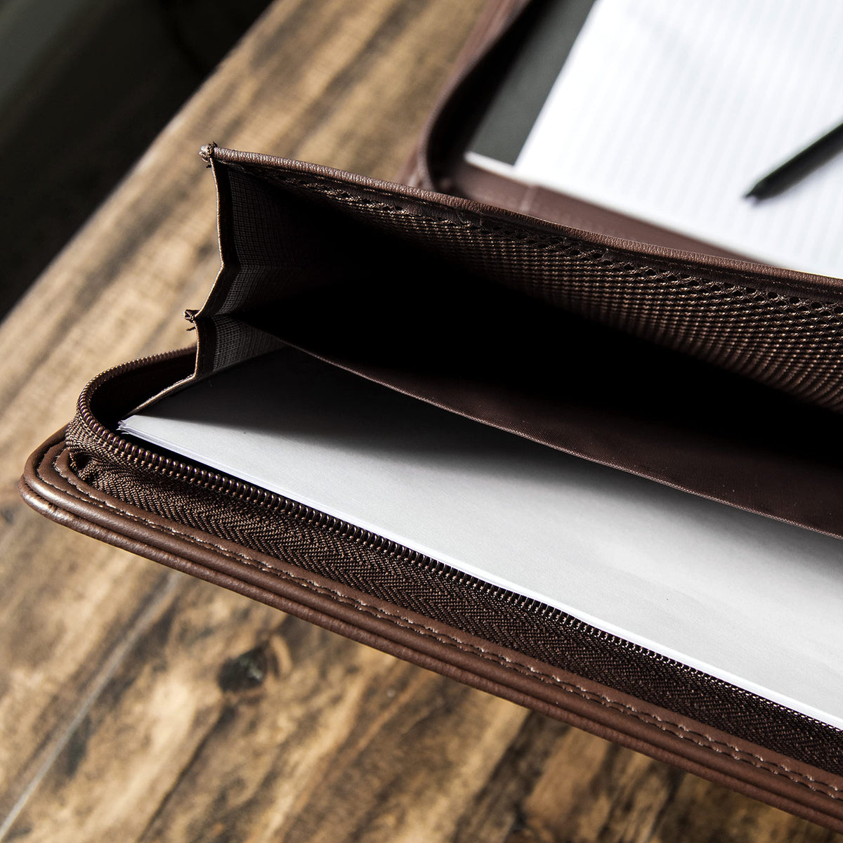 Cossini Premium Business Portfolio with Zipper – Padfolio - Superior Business Impressions Begin with PU Vegan Leather, 10.1 Inch Tablet Sleeve, Smart Storage, Solar Calculator, Writing Pad -Brown